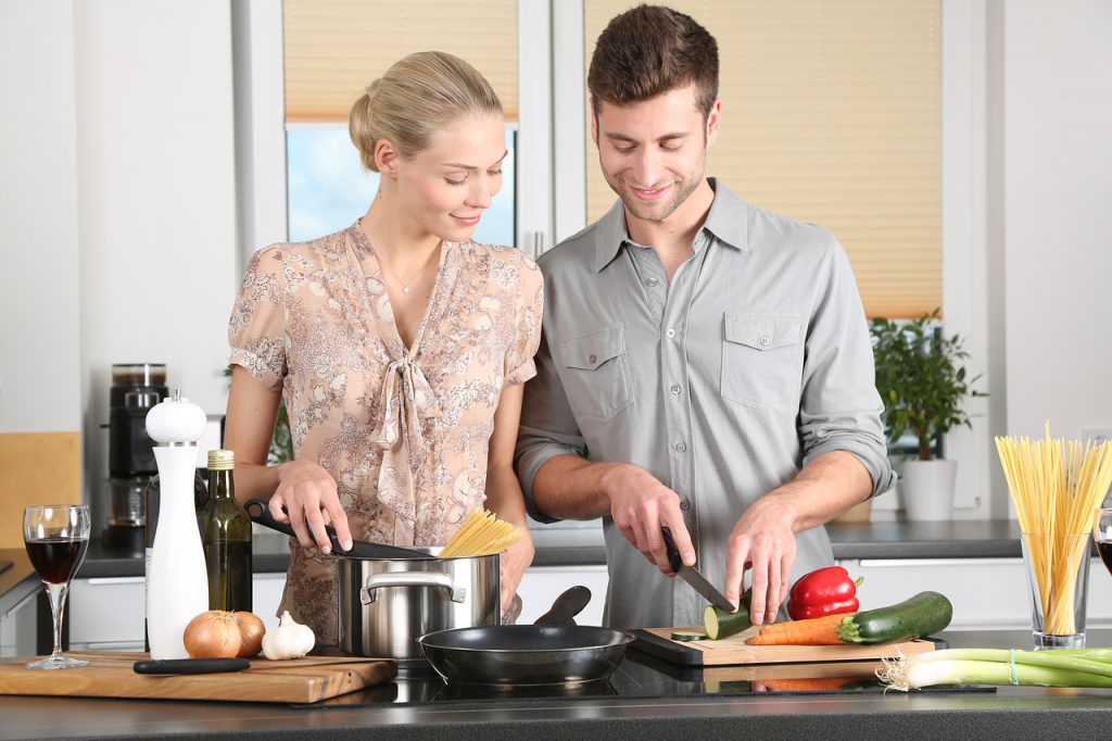 woman and men cooking